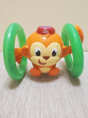 Bright Starts Roll & Glow Monkey baby/toddler music toy